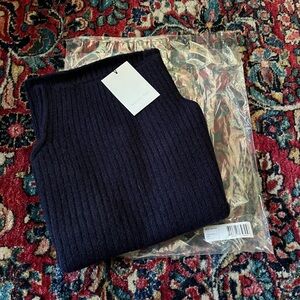 Mijeong Park knit neck warmer.